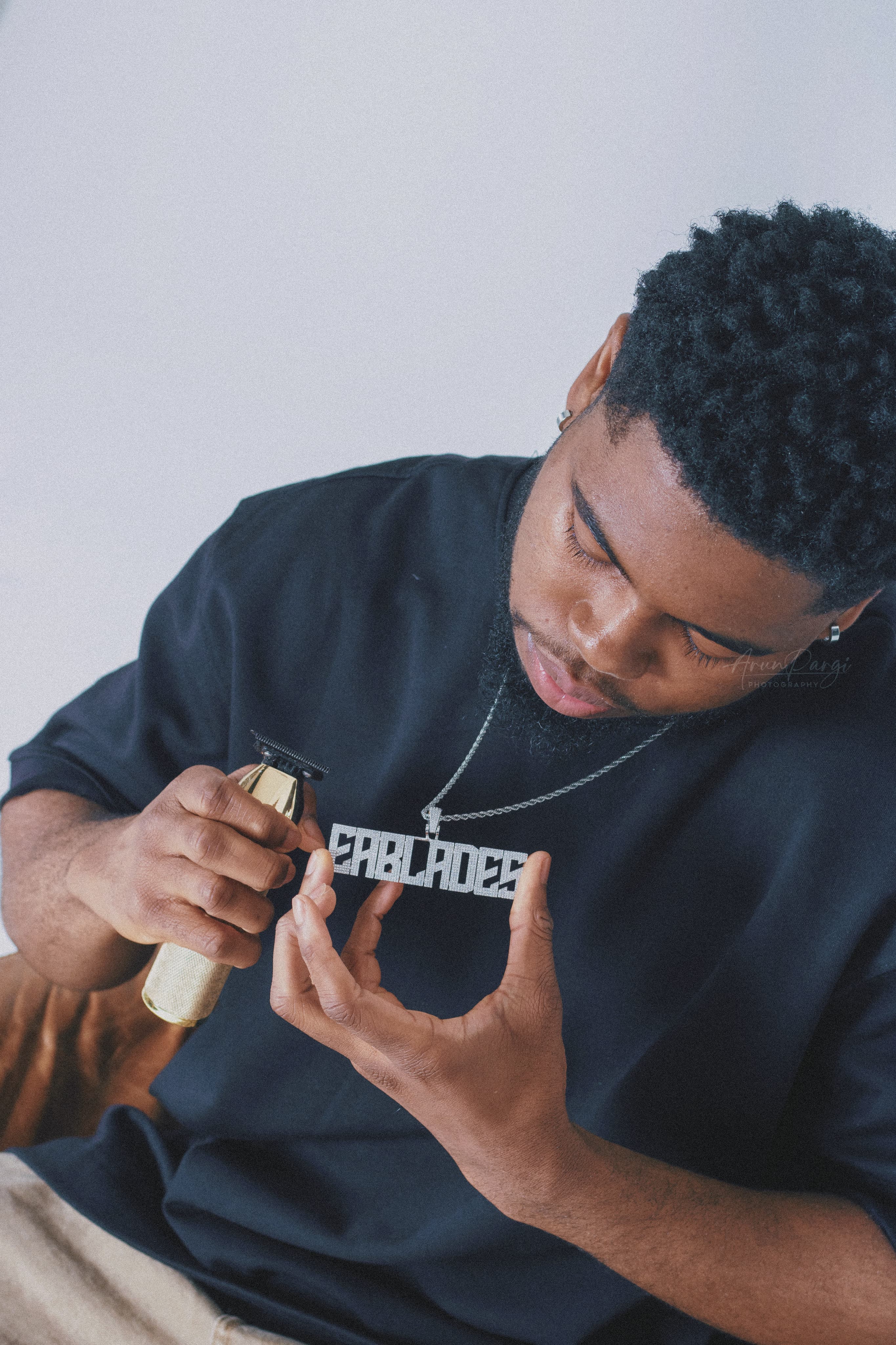 Barber performing a fade haircut